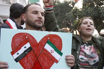 Протестите привличат вниманието към огромната и сенчеста война на Иран в Сирия